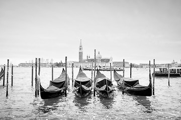 Image showing Gondolas with view of San Giorgio Maggiore bw