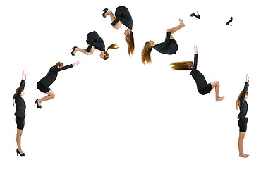 Image showing Business woman making  a front flip