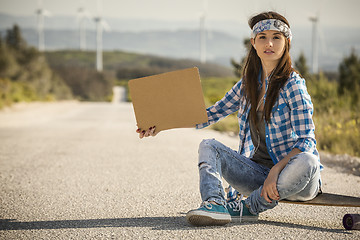 Image showing Hitchhiking girl 