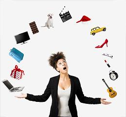 Image showing Afro-American woman juggling objects