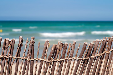 Image showing Short of a fence at the beach