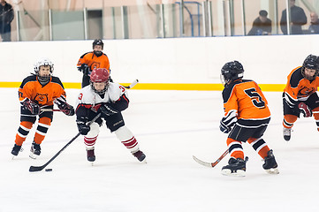 Image showing Game between children ice-hockey teams