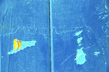 Image showing stripped paint in the blue yellow
