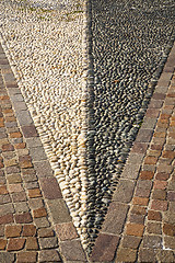 Image showing near mozzate  abstract   pavement of a curch   wall marble