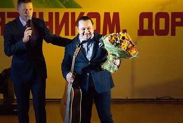 Image showing Igor Sarukhanov with a flowers