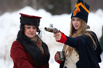 Image showing Woman with a gun