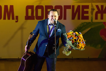 Image showing Igor Sarukhanov with a flowers