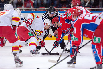 Image showing P. Virtanen (26) and J. Murshak (74) on faceoff