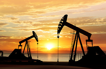 Image showing silhouette of oil pumps