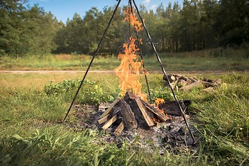 Image showing Camp fire outdoors burning