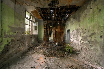 Image showing Dark room interior with damaged roof