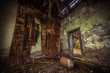 Image showing Dark room interior with damaged roof