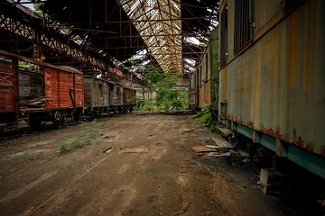 Image showing Cargo trains in old train depot