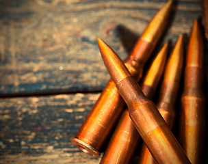 Image showing Still life with five rifle cartridges