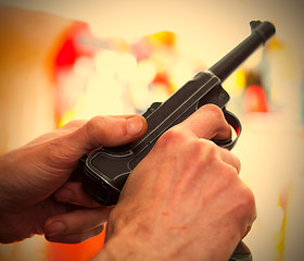 Image showing Luger Parabellum automatic pistol in a hands