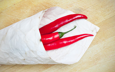 Image showing red hot chili peppers in paper bags