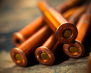 Image showing Still life with five rifle cartridges