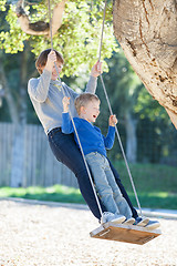 Image showing family at swings