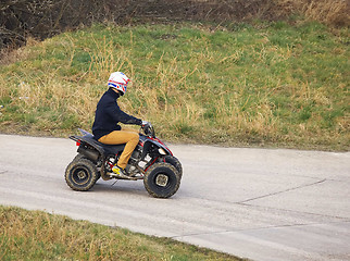 Image showing Young man on a quad