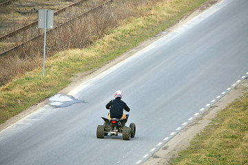 Image showing Young man on a quad