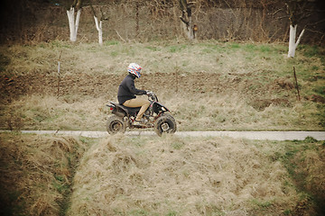 Image showing Young man on a quad