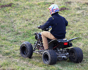 Image showing Young man on a quad