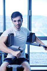 Image showing man running on the treadmill