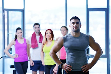 Image showing Group of people exercising at the gym