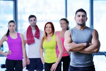 Image showing Group of people exercising at the gym