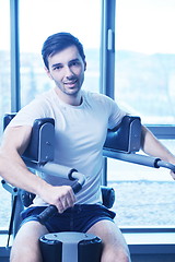 Image showing man running on the treadmill