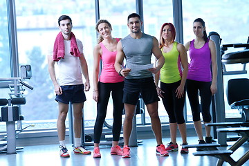 Image showing Group of people exercising at the gym