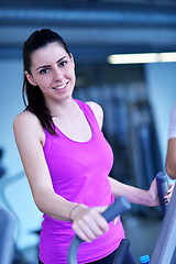 Image showing woman exercising on treadmill in gym