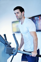 Image showing man running on the treadmill