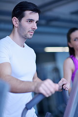 Image showing man running on the treadmill