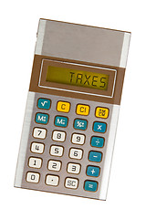 Image showing Old calculator - taxes