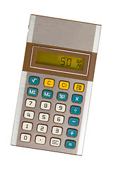 Image showing Old calculator showing a percentage - 50 percent