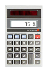 Image showing Old calculator showing a percentage - 75 percent