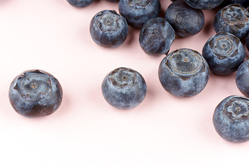 Image showing Blueberries over pink