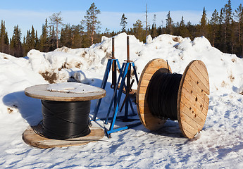 Image showing cable drums in the snow