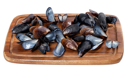 Image showing Shells of mussels on wooden board