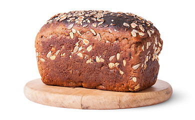 Image showing Unleavened bread with seeds on wooden board