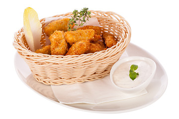 Image showing Crumbed chicken nuggets in a basket