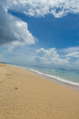 Image showing Beautiful tropical beach with lush vegetation