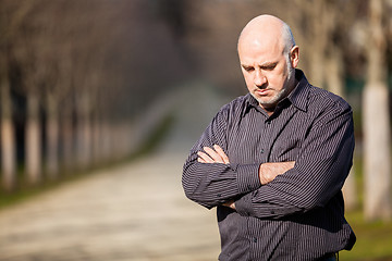 Image showing Confident attractive man standing waiting