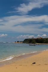 Image showing Beautiful tropical beach with lush vegetation