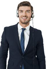 Image showing Man wearing headset with stereo headphones