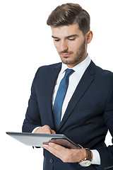 Image showing Businessman using a tablet computer