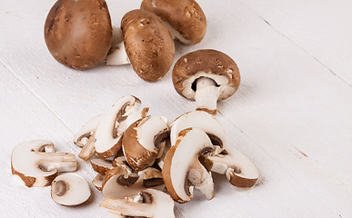 Image showing Diced and whole agaricus brown button mushrooms