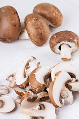 Image showing Diced and whole agaricus brown button mushrooms