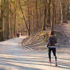 Image showing Woman hiking in nature. 